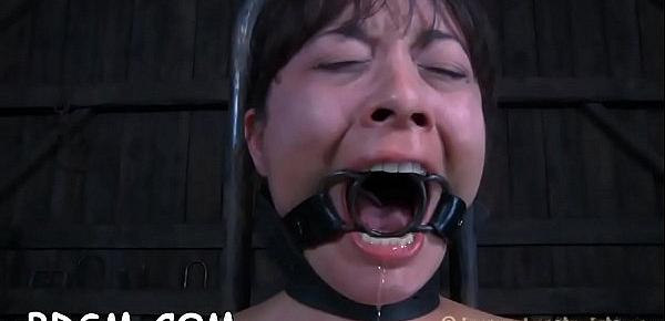  Clamped up girl gets her fuck holes tortured